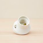 PORTA LAMPARA CURVO BAQUELITA MARFIL 91110501569