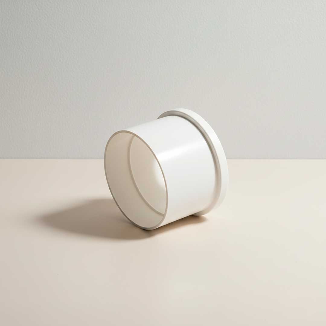610 CUPLA 100MM BLANCA DE PVC KRONA K-647 - Imagen 1